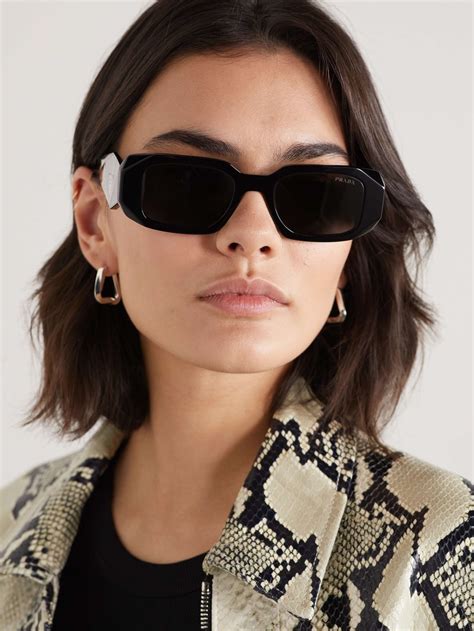 Results for prada sunglasses .